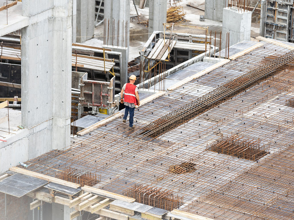 Reinforced concrete structure under construction with rebar placement before concrete pour