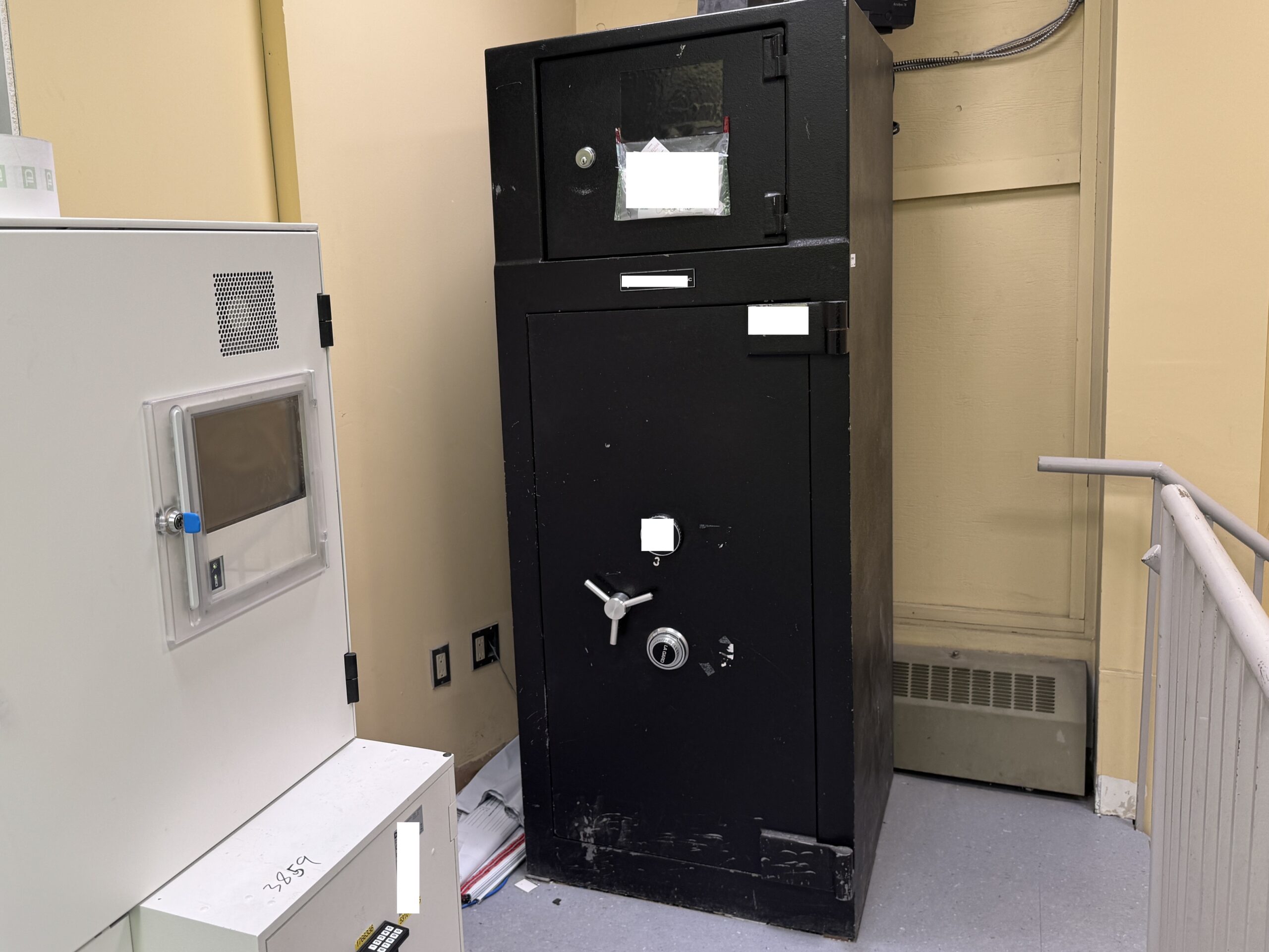 Heavy commercial safe installed on an upper floor requiring structural assessment and floor load evaluation.